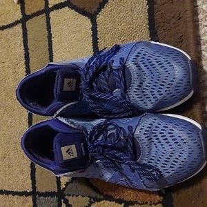 A pair of a Adidas women size7